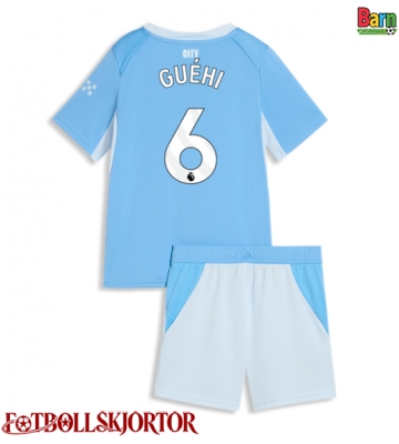 Manchester City Marc Guehi #6 Hemmakläder Barn 2026-27 Kortärmad (+ Korta byxor)